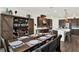 Farmhouse style dining room with wood table and sliding barn door at 3875 Bowfin Trl, Kissimmee, FL 34746