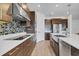 Modern kitchen with stainless steel appliances and an island at 3875 Bowfin Trl, Kissimmee, FL 34746