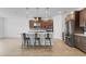 Modern kitchen with stainless steel appliances and an island at 3875 Bowfin Trl, Kissimmee, FL 34746