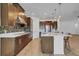 Modern kitchen with stainless steel appliances and an island at 3875 Bowfin Trl, Kissimmee, FL 34746
