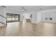 Spacious living area with tile flooring and an open concept design at 3875 Bowfin Trl, Kissimmee, FL 34746