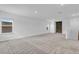 Bright and airy loft bedroom with neutral decor and carpet at 3875 Bowfin Trl, Kissimmee, FL 34746