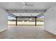 Covered patio with paver stones and ceiling fans at 3875 Bowfin Trl, Kissimmee, FL 34746