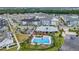 Aerial view of community with pool and lake at 1862 Beach Ridge Rd, Celebration, FL 34747