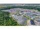 Aerial view of community featuring a lake and lush landscaping at 1862 Beach Ridge Rd, Celebration, FL 34747