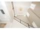 Two-story foyer with a chandelier and natural light from windows at 1862 Beach Ridge Rd, Celebration, FL 34747