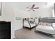 Charming bedroom with bunk beds, ceiling fan and soft, neutral colors at 1370 Tuscan Ter # 2104, Davenport, FL 33896