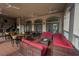 Enjoy the covered patio with comfortable seating and ceiling fans at 1370 Tuscan Ter # 2104, Davenport, FL 33896