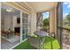Cozy screened patio with artificial turf offering a relaxing outdoor space at 1370 Tuscan Ter # 2104, Davenport, FL 33896