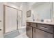 Clean bathroom with a walk in shower and modern vanity at 4222 Paragraph Dr, Kissimmee, FL 34746
