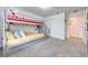 bedroom with bunk beds and ample closet space at 4222 Paragraph Dr, Kissimmee, FL 34746