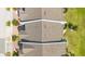 An aerial shot showcases new roofs of townhomes, with meticulous landscaping and brick driveways at 2106 Chatham Place Dr, Orlando, FL 32824