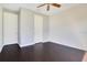 Bedroom featuring dark wood flooring and neutral paint at 2106 Chatham Place Dr, Orlando, FL 32824