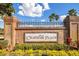 Chatham Place brick entrance sign with decorative ironwork and well-maintained landscaping at 2106 Chatham Place Dr, Orlando, FL 32824