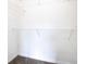 A functional walk-in closet equipped with shelving for organized storage at 2106 Chatham Place Dr, Orlando, FL 32824