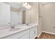 Bathroom boasts double vanity, a shower, and tile flooring at 3345 Chicory Ct, Lake Hamilton, FL 33851