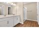 Double vanity bathroom with a walk-in shower at 3345 Chicory Ct, Lake Hamilton, FL 33851
