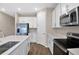 Modern kitchen with stainless steel appliances and an island at 3345 Chicory Ct, Lake Hamilton, FL 33851