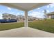 Covered patio overlooks the backyard and neighborhood at 3345 Chicory Ct, Lake Hamilton, FL 33851