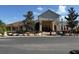 Inviting community clubhouse entrance with landscaped grounds and prominent signage, 2501 at 4980 W Castle W St, Kissimmee, FL 34758
