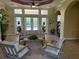 Comfortable lobby seating area with neutral tones, natural light and views of the outdoors at 4980 W Castle W St, Kissimmee, FL 34758