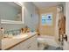 Well-lit bathroom features a shower-tub combo, vanity with sink, and ample counter space at 19529 Dorr Rd, Altoona, FL 32702