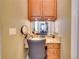 Granite countertop vanity with cherry stained wood drawers and cabinets at 19529 Dorr Rd, Altoona, FL 32702