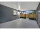 Enclosed patio area with concrete flooring, block wall, and screened windows at 1318 Terre Cia Ave, Orlando, FL 32807