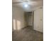 Cozy bedroom featuring modern flooring, an open closet, and neutral decor at 2647 Surrey Ct # 2647, Kissimmee, FL 34741