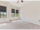 Bright bedroom with carpet and windows providing natural light at 501 Mirasol Cir # 424, Celebration, FL 34747
