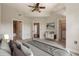 Inviting bedroom featuring neutral colors, plush carpeting, and ensuite bathroom at 501 Mirasol Cir # 424, Celebration, FL 34747