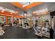 Well-equipped fitness center with various exercise machines and mirrors at 501 Mirasol Cir # 424, Celebration, FL 34747
