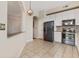 Spacious open-concept area features a view of the kitchen, creating an inviting flow at 501 Mirasol Cir # 424, Celebration, FL 34747