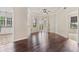Open living room with hardwood floors, and access to balcony at 501 Mirasol Cir # 424, Celebration, FL 34747