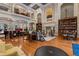 Expansive lobby with high ceilings, a fireplace, cozy seating areas and elegant architectural details at 501 Mirasol Cir # 424, Celebration, FL 34747