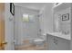 Clean, bright bathroom with white tile, shower and bath combination with vanity at 3145 Britannia Blvd # D, Kissimmee, FL 34747