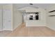 Open-concept living space flows into a kitchen, creating an inviting atmosphere at 3145 Britannia Blvd # D, Kissimmee, FL 34747