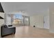 Bright, open living room featuring large windows and comfortable seating at 3145 Britannia Blvd # D, Kissimmee, FL 34747