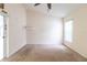 Cozy bedroom with neutral carpet and sliding glass door access at 162 Seneca Point Trl, Kissimmee, FL 34746