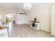 Bright living room with tile floors and a decorative chandelier at 162 Seneca Point Trl, Kissimmee, FL 34746