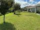 Large backyard with fence and well maintained landscaping at 4183 Cortland Dr, Davenport, FL 33837