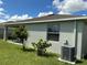 Image of backyard with grass, shrubs and trees at 4183 Cortland Dr, Davenport, FL 33837