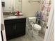 Bathroom featuring sink with granite countertops and a shower with floral curtain at 4183 Cortland Dr, Davenport, FL 33837