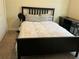 Nicely furnished bedroom with black furniture and large bed at 4183 Cortland Dr, Davenport, FL 33837