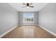 Neutral bedroom with tile floors and a large window providing natural light at 2217 Grand Cayman Ct # 1233, Kissimmee, FL 34741