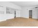 Bright living room with open floor plan, tile floors, and easy access to kitchen and front door at 2217 Grand Cayman Ct # 1233, Kissimmee, FL 34741