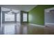 An open living room featuring tile flooring, ceiling fan, and bright windows for natural light at 2217 Grand Cayman Ct # 1233, Kissimmee, FL 34741