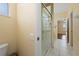 Bathroom featuring a glass shower door and tile flooring at 3222 Stonehurst Cir, Kissimmee, FL 34741