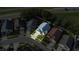 Overhead shot displays a home in a residential area near a highway at 5906 Rywood Dr, Orlando, FL 32810