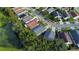 View of home in residential area with highway and natural pond nearby at 5906 Rywood Dr, Orlando, FL 32810